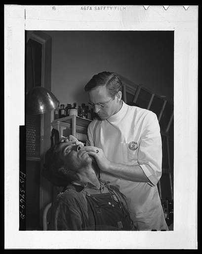 Wilson Dam, Alabama (Tennessee Valley Authority (TVA)). Workers in chemical plant receive free medical care