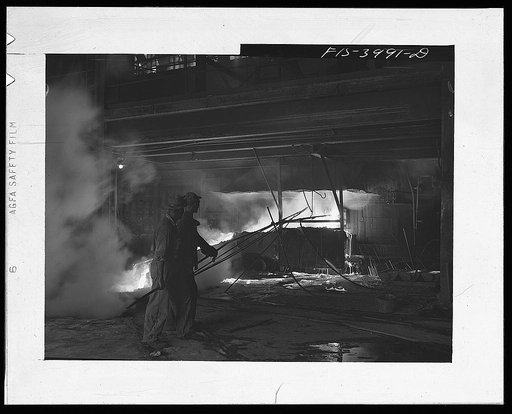 Wilson Dam, Alabama (Tennessee Valley Authority (TVA)). Tapping the slag at a phosphorus furnace at a chemical plant