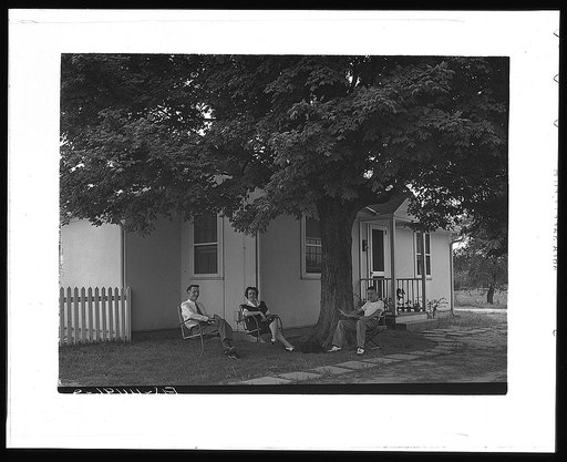 Florence, Alabama (Tennessee Valley Authority (TVA)). Gordon Williams, electrician at Wilson Dam, lives in this demountable prefabricated defense house at Florence, Alabama