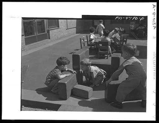 Queens, New York. Nursery school at the Queensbridge housing project. Children playing with blocks