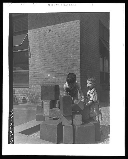 Queens, New York. Playing with blocks at the nursery school at Queensbridge housing project