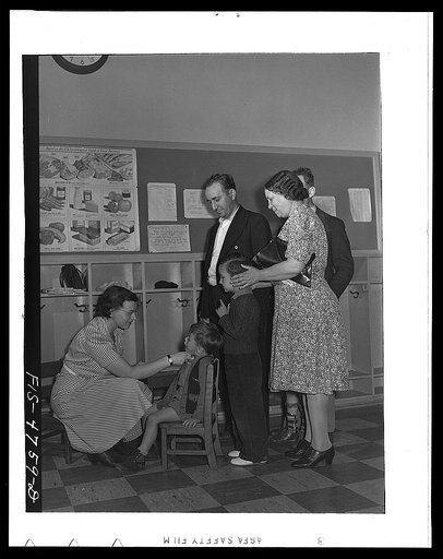 Queens, New York. Nursery school at the Queensbridge housing project. Parents bring their children to the nursery