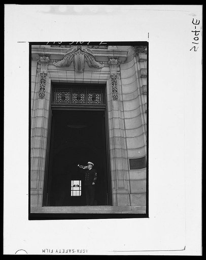 U.S. Naval Academy, Annapolis, Maryland. Chief petty officer blowing a bugle call