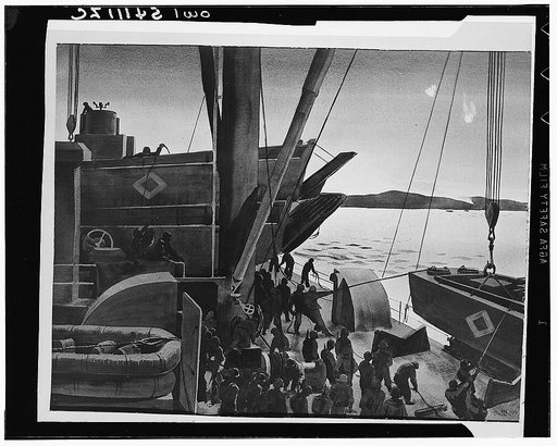 Debarkation station aboard a transport bound for Salerno. "H" hour approaches, this time at Salerno. Assault craft are swung to deck level for loading and lowering into the sea. As flares are dropped from enemy planes and Allied naval and air bombardment shatters the coast, troops take their assigne