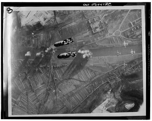 Untitled negative showing an attack of USAAF Martin B-26 Marauder bombers on the railroad bridge across the Moselle River at Trier-Pfalzel, Rhineland-Palatinate, Germany, Dec. 24, 1944