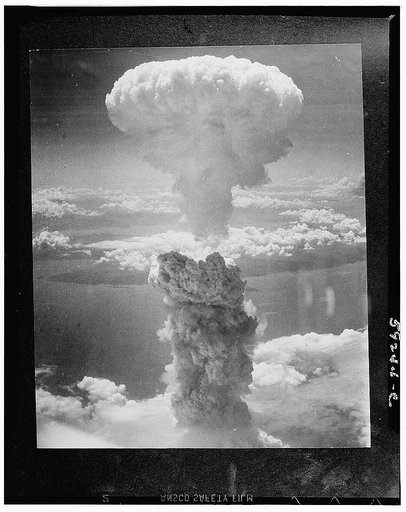 Bikini attol (in the Pacific ocean). Aerial view of clouds raised by test explosion of an atomic bomb