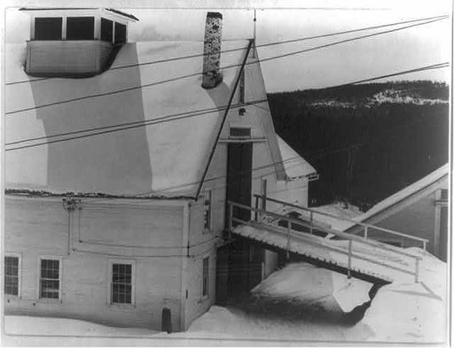 Portrait of America. No. 36. Rural electrification in the U.S. An impressive array of electric power lines leads to this modern American barn on a farm in the eastern state of New Hampshire. The lines provide power for farm machinery and appliances, and illumination for the home. This farm is locate