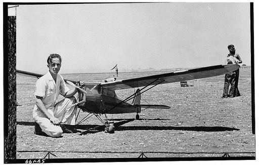 America's youth builds and flies model planes on miniature flying fields. This young American aviation enthusiast, Orin Anderson, poses behind his giant model plane at Kelly Field in the city of San Antonio in the southwestern U.S. state of Texas where members of the Gas Model Club do their weekly f
