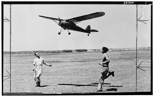 America's youth builds and flies model planes on miniature flying fields.Two American boys give their giant model plane a running start at Kelly Field in the city of San Antonio in the southwestern U.S. state of Texas where members of the Gas Model Club do their weekly flying. The plane, which weigh