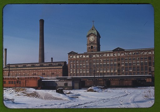 Railroad cars and factory buildings in Lawrence, Mass.