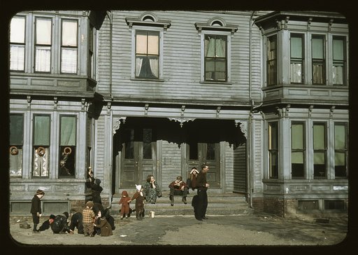 Children with adult in the tenement district, Brockton, Massachusetts