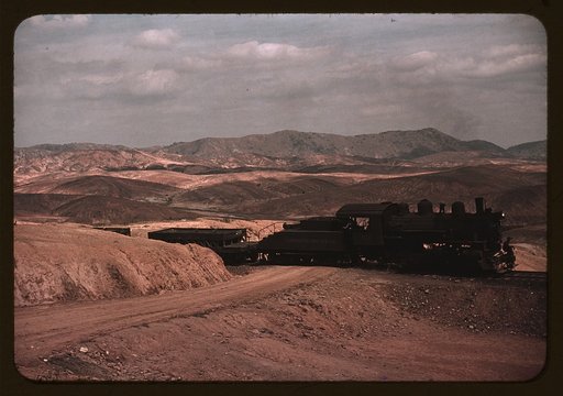 A train bringing copper ore out of the mines, Ducktown, Tenn. Fumes from smelting copper for sulfuric acid have destroyed all vegetation and eroded the land