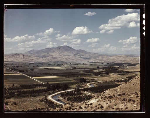 Cherry orchards, farm lands and irrigation ditch at Emmett, Idaho