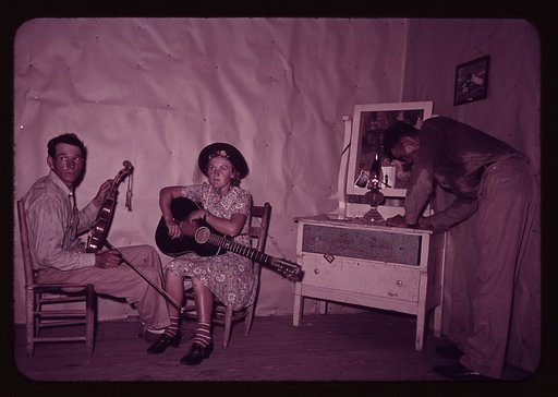 Orchestra during intermission at square dance; notice sweated shirt of host, McIntosh County, Oklahoma