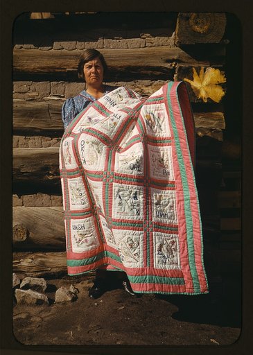 Mrs. Bill Stagg with state quilt, Pie Town, New Mexico