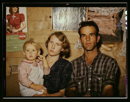 Jack Whinery, homesteader, with his wife and the youngest of his five children, Pie Town, New Mexico