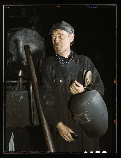 Welder at the C & NW RR [i.e. Chicago and North Western railroad] locomotive shops, 40th Street shops, Chicago, Ill.