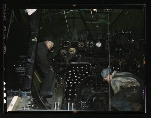 Working on the cab of a locomotive brought in for repair at the C & NW RR [i.e. Chicago and North Western railroad], 40th Street shops, Chicago, Ill.
