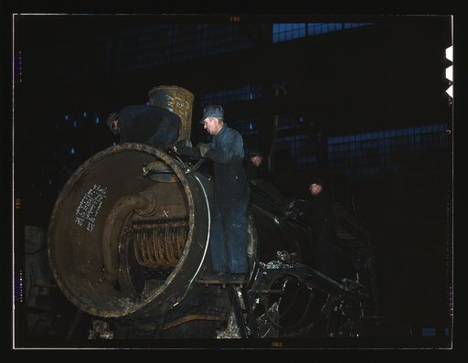 Working on the boiler of a locomotive at the 40th Street shops of the C & NW RR [i.e. Chicago and North Western railroad], Chicago, Ill.