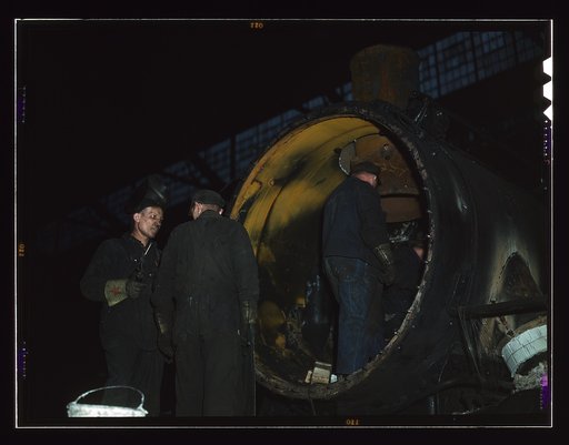 Working on the boiler of a locomotive at the 40th Street shops of the C & NW RR [i.e. Chicago and North Western railroad], Chicago, Ill.