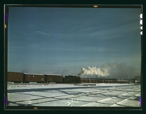 A train pulling out of the freight house at C & NW RR's Proviso(?) yard, Chicago, Ill.