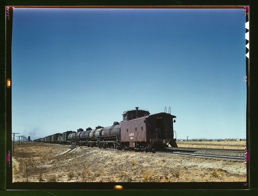 Santa Fe R.R. west bound freight stopping for water, Melrose, N[ew] Mex[ico