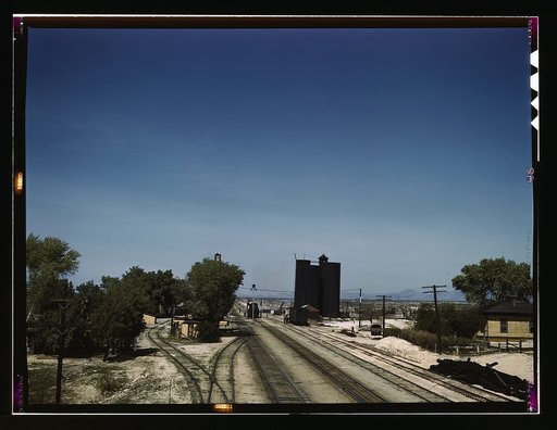 Santa Fe R.R. going through Yucca, Arizona; a watering and refueling stop