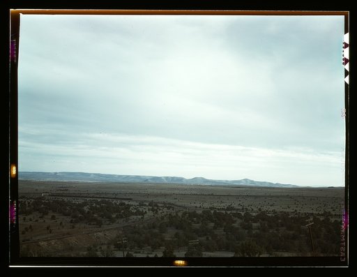 Santa Fe R.R. freight train rounding a curve between Ash Fork and Gleed, Arizona