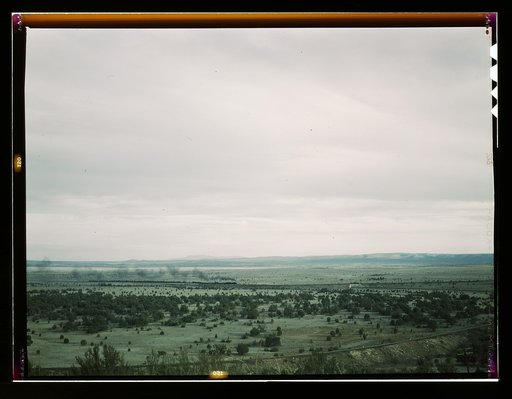 Santa Fe R.R. freight train rounding a curve between Ash Fork and Gleed, Arizona