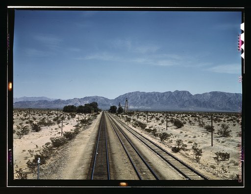 Santa Fe R.R. line leaving Cadiz, Calif. This town is a junction point with a branch going to Phoenix, Ariz.