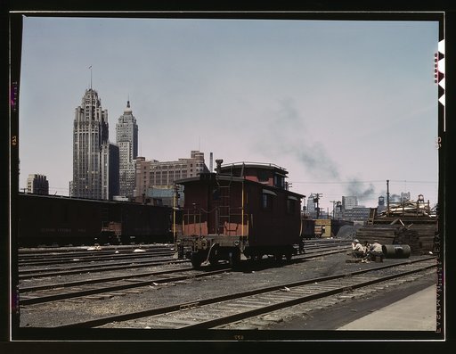 General view of part of the South Water street freight depot of the Illinois Central Railroad, Chicago, Ill. A C and O R.R. caboose. the C and O is one of the railroads that lease terminal facilities from the I.C.R.R