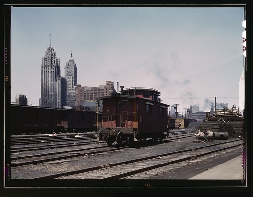 General view of part of the south Water street freight depot of the Illinois Central Railroad, Chicago, Ill. A C and O R.R. caboose. the C and O is one of the railroads that lease terminal facilities from the I.C.R.R