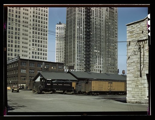 Diesel switch engine moving freight cars at the South Water street freight terminal of the Illinois Central R.R., Chicago, Ill.