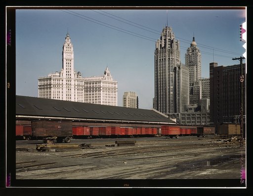 Trucks unloading at the inbound freight house of the Illinois Central Railroad, South Water Street freight terminal, Chicago, Ill.