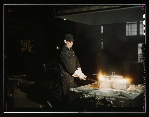 John Kelseh [i.e., Kelsch], blacksmith, at his forge in the blacksmith shop at the roundhouse, Rock Island R.R., Blue Island, Ill.