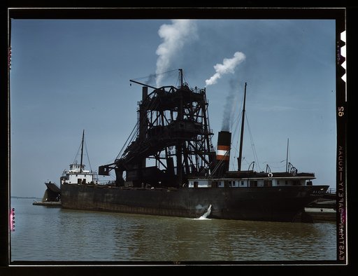 Loading coal into a freighter at one of the Pennsylvania Railroad docks, Sandusky, Ohio