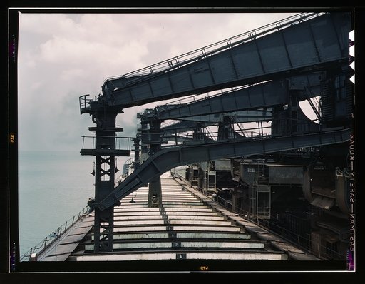 Pennsylvania R.R. ore docks, unloading iron ore from a lake freighter by means of "Hulett" unloaders, Cleveland, Ohio