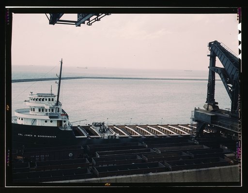 Pennsylvania R.R. [Railroad] ore docks, unloading iron ore from a lake freighter by means of "Hulett" unloaders, Cleveland, Ohio