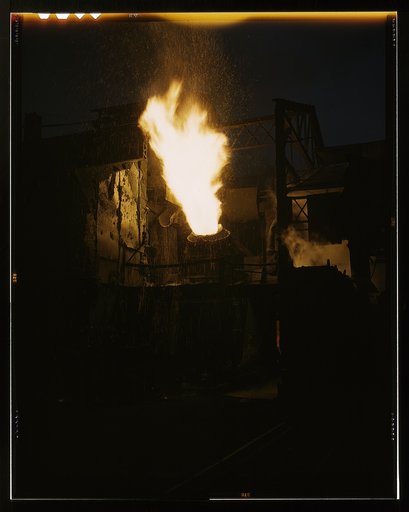 A scene in a steel mill, Republic Steel Mill, Youngstown, Ohio. Molten iron is blown in an Eastern Bessemer converter to change it to steel for war essentials
