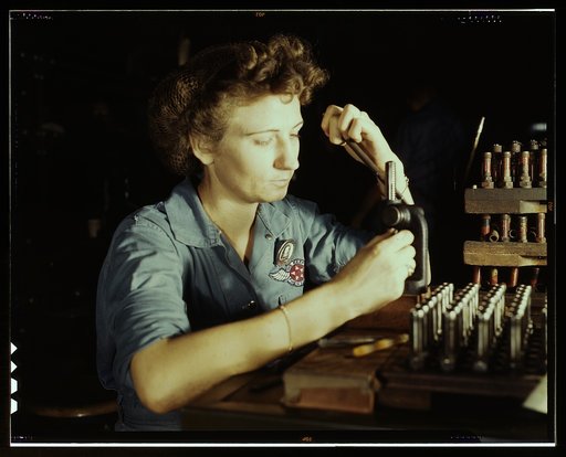 Mrs. Doris Duke, who is 26 and a mother of one child, Corpus Christi, Texas. Mrs. Duke is a civil service worker in the A[ssembly] and R[epair] dept. at the Navy Air Base (shot - reconditioning spark plugs)