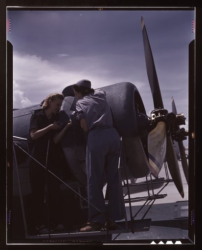Bowen and Olsen, a riveter and her supervisor, in the Assembly and Repair Dept. at the Naval Air Base, Corpus Christi, Texas