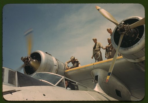 Working on a plane at the Naval Air Base, Corpus Christi, Texas