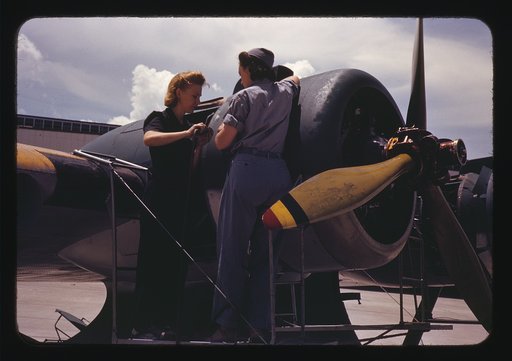 Bowen, a riveter, and Olsen, her supervisor, in the Assembly and Repair Dept. at the Naval Air Base, Corpus Christi, Texas