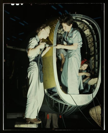 Riveters at work on fuselage of Liberator Bomber, Consolidated Aircraft Corp., Fort Worth, Texas