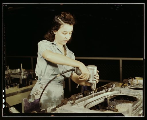 Drilling a wing bulkhead for a transport plane at the Consolidated Aircraft Corporation plant, Fort Worth, Texas