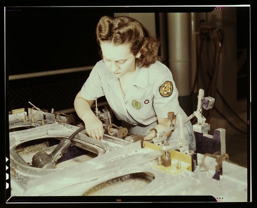 Drilling a wing bulkhead for a transport plane at the Consolidated Aircraft Corporation plant, Fort Worth, Texas