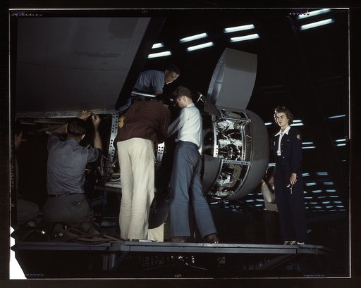 Installing an engine at the Consolidated Aircraft Corporation plant, Fort Worth, Texas