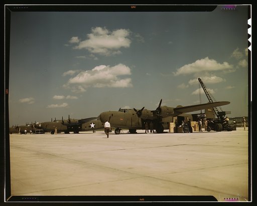 Loading new transport planes at the Consolidated Aircraft Corporation plant, Fort Worth, Texas