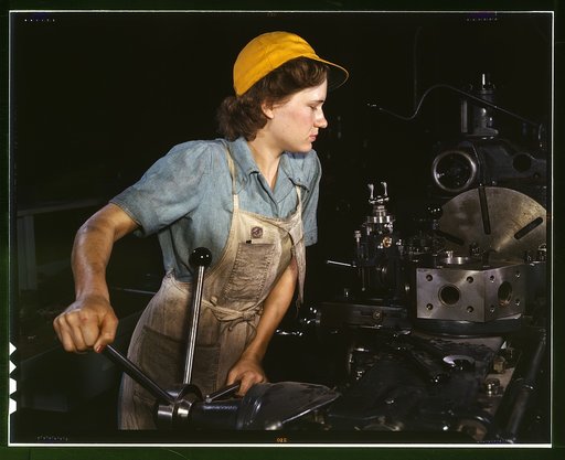 Lathe operator machining parts for transport planes at the Consolidated Aircraft Corporation plant, Fort Worth, Texas