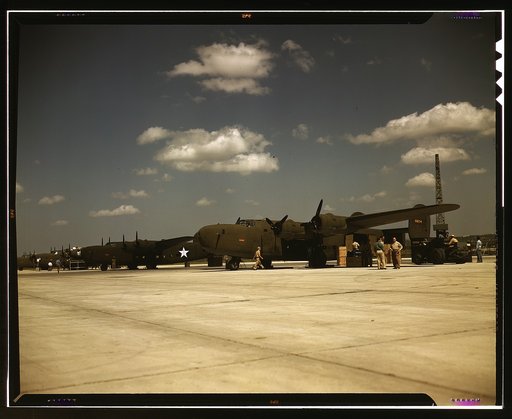 Consolidated transport planes being loaded, Consolidated Aircraft Corp., Fort Worth, Texas